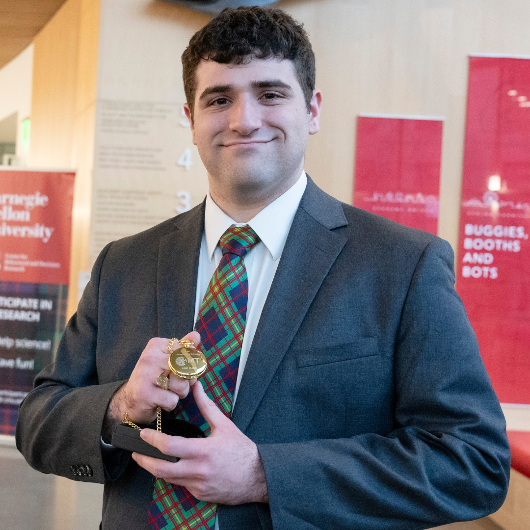 Ben Glaser holding 3MT award