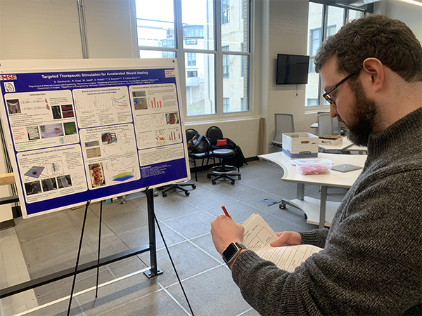 Student at a poster presentation