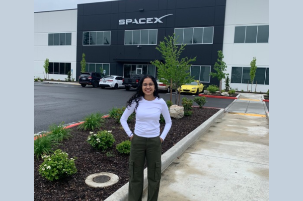 Shagun standing in front of SpaceX building