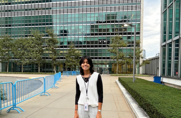 Photo of Aleena in front of building